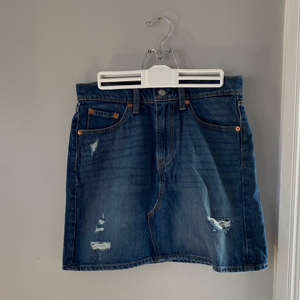 Levi’s jean skirt dark wash, with few rips